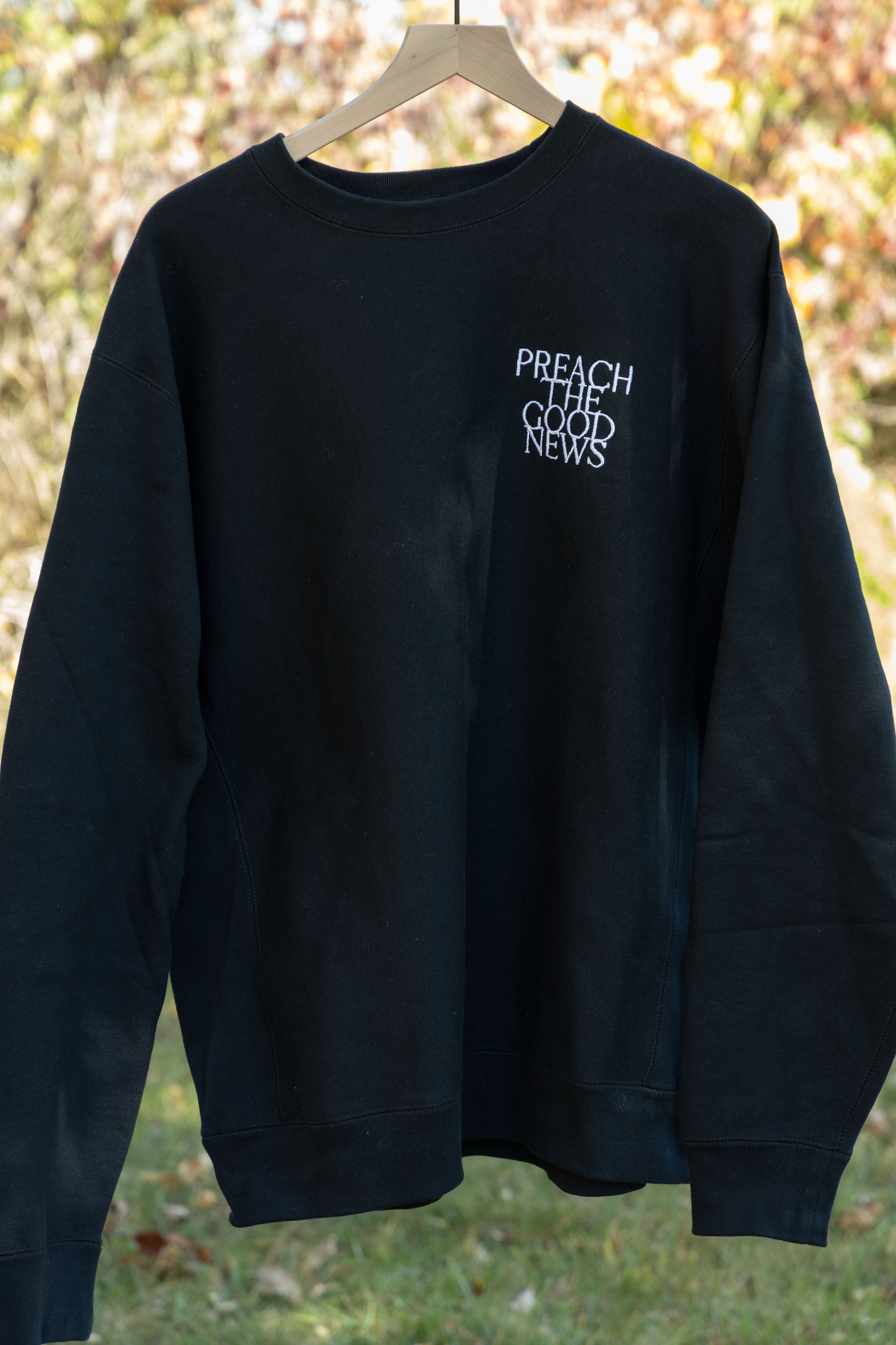 PREACH THE GOOD NEWS PREMIUM CREWNECK black front