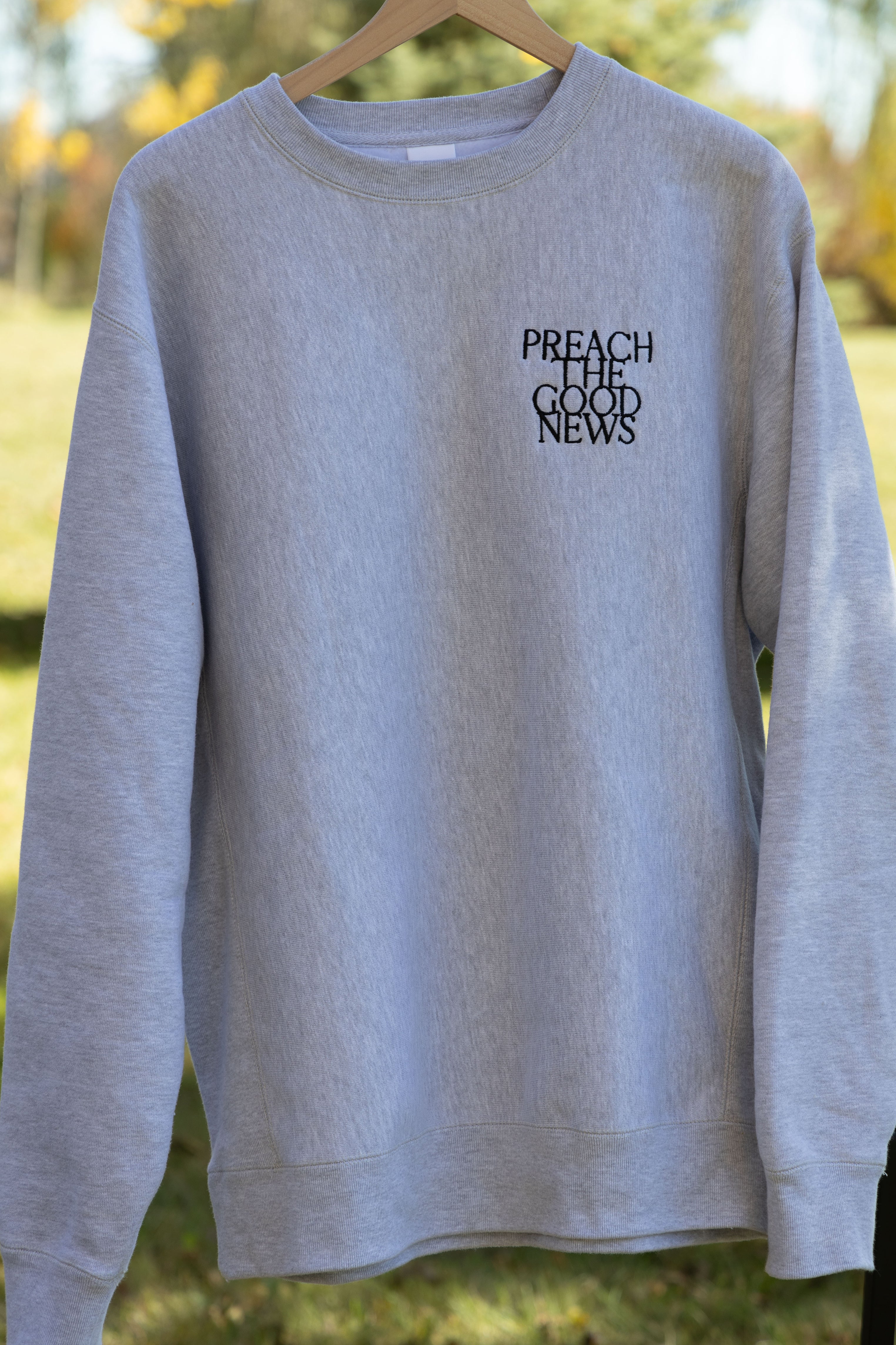 PREACH THE GOOD NEWS PREMIUM CREWNECK gray front