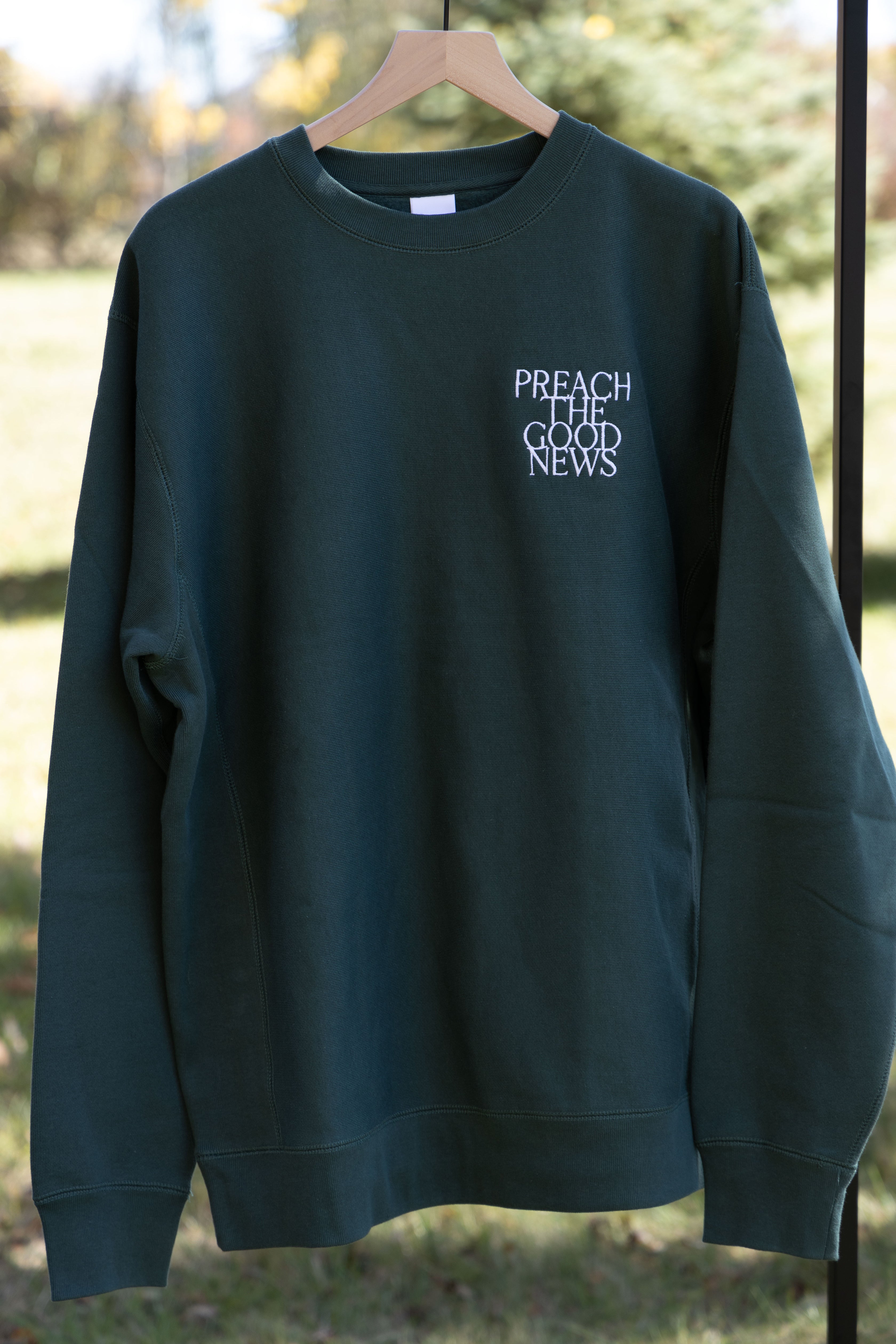 PREACH THE GOOD NEWS PREMIUM CREWNECK green front