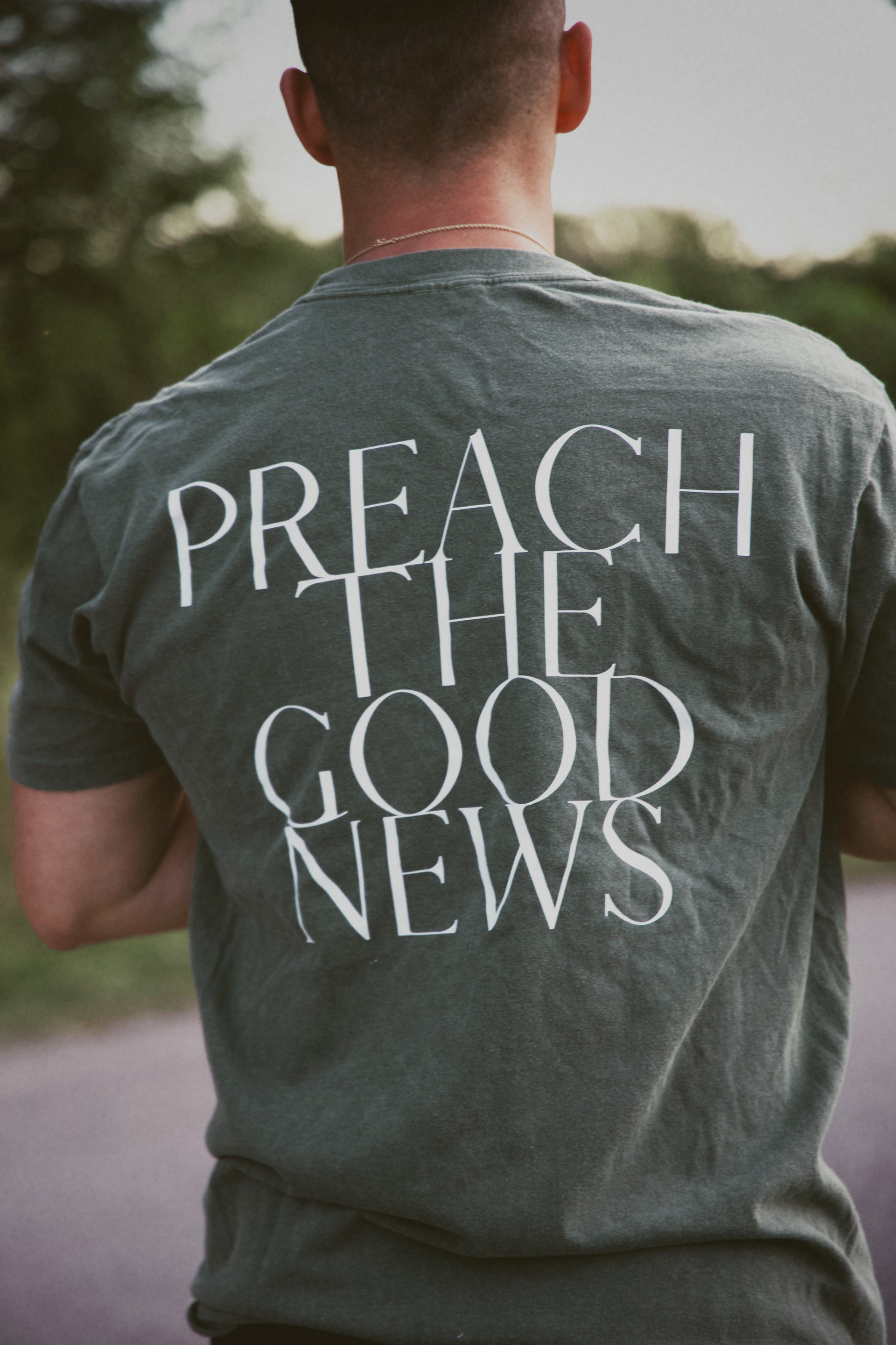 PREACH THE GOOD NEWS TEE green back print