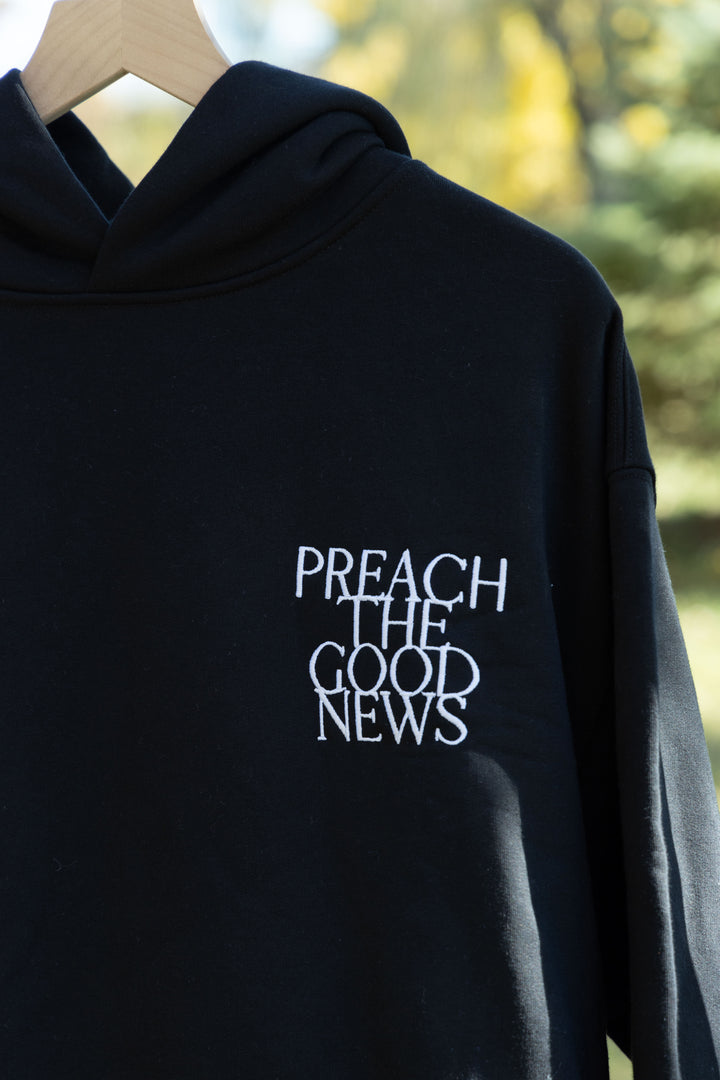 preach the good news hoodie black front detail embroidery