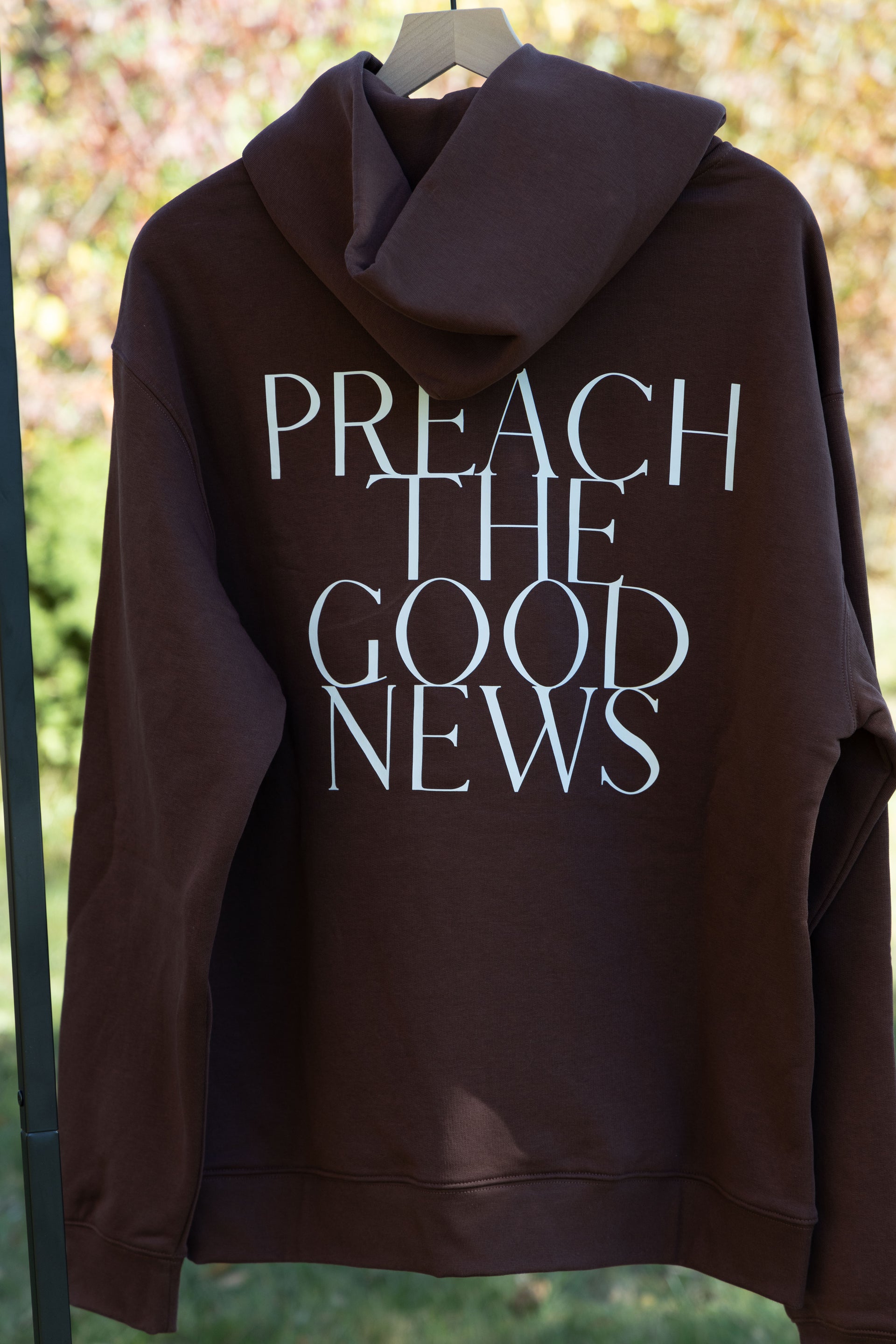preach the good news hoodie brown back