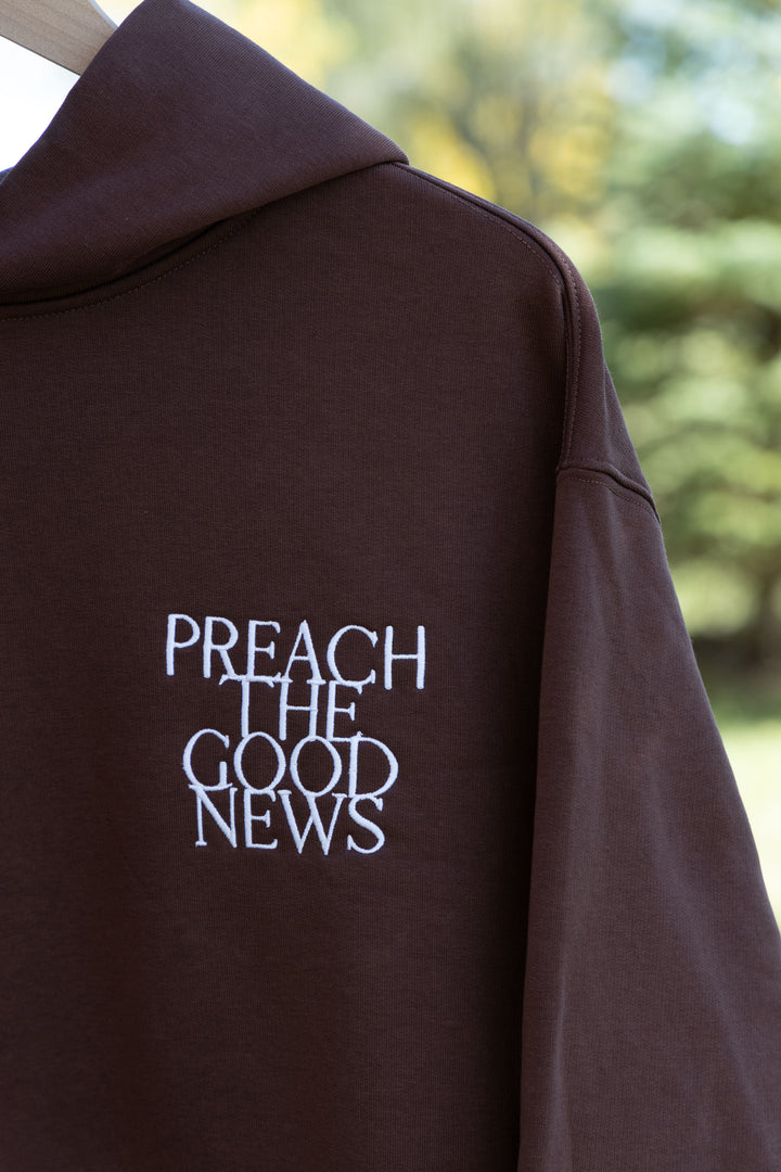preach the good news brown hoodie detail