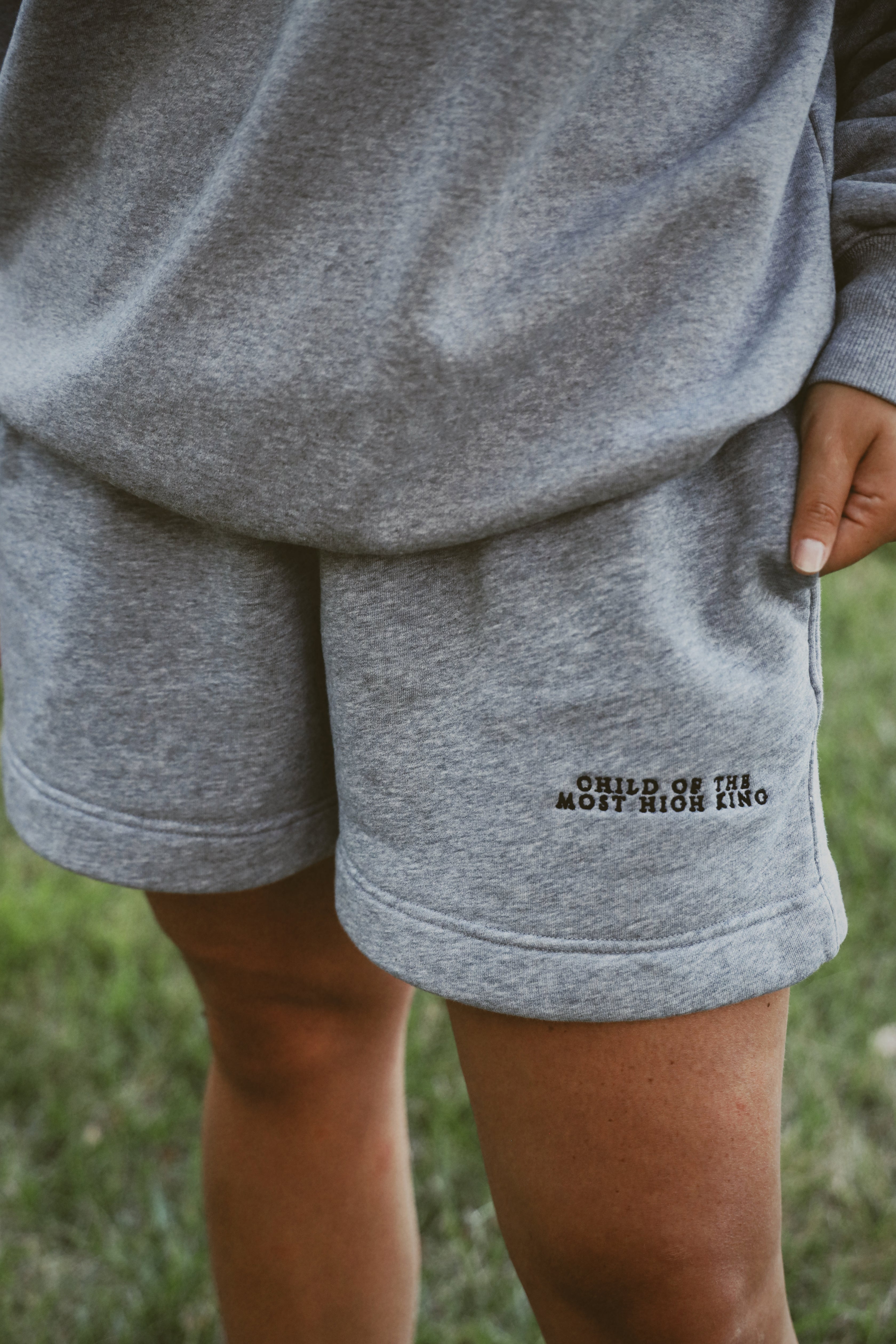 CHILD OF THE MOST HIGH KING SHORT front embroidery detail