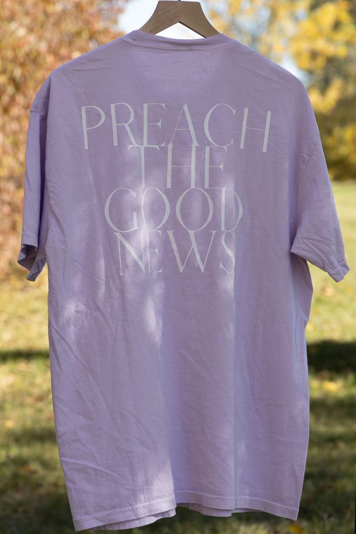 PREACH THE GOOD NEWS TEE purple back print