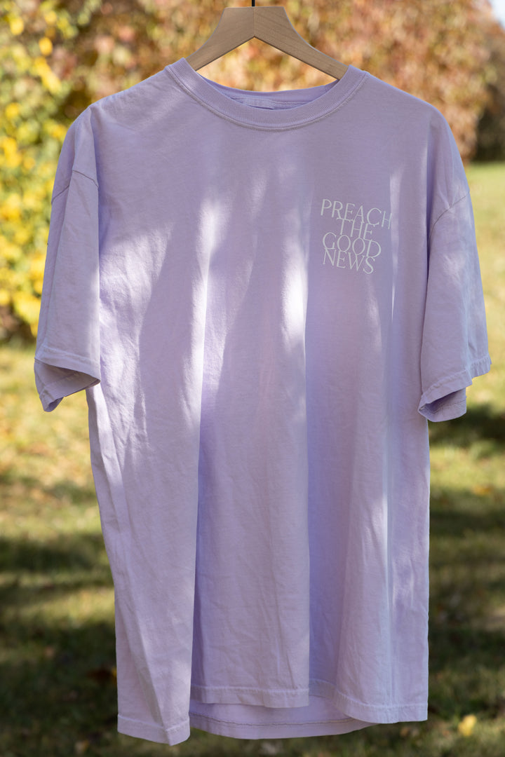 PREACH THE GOOD NEWS TEE purple front full