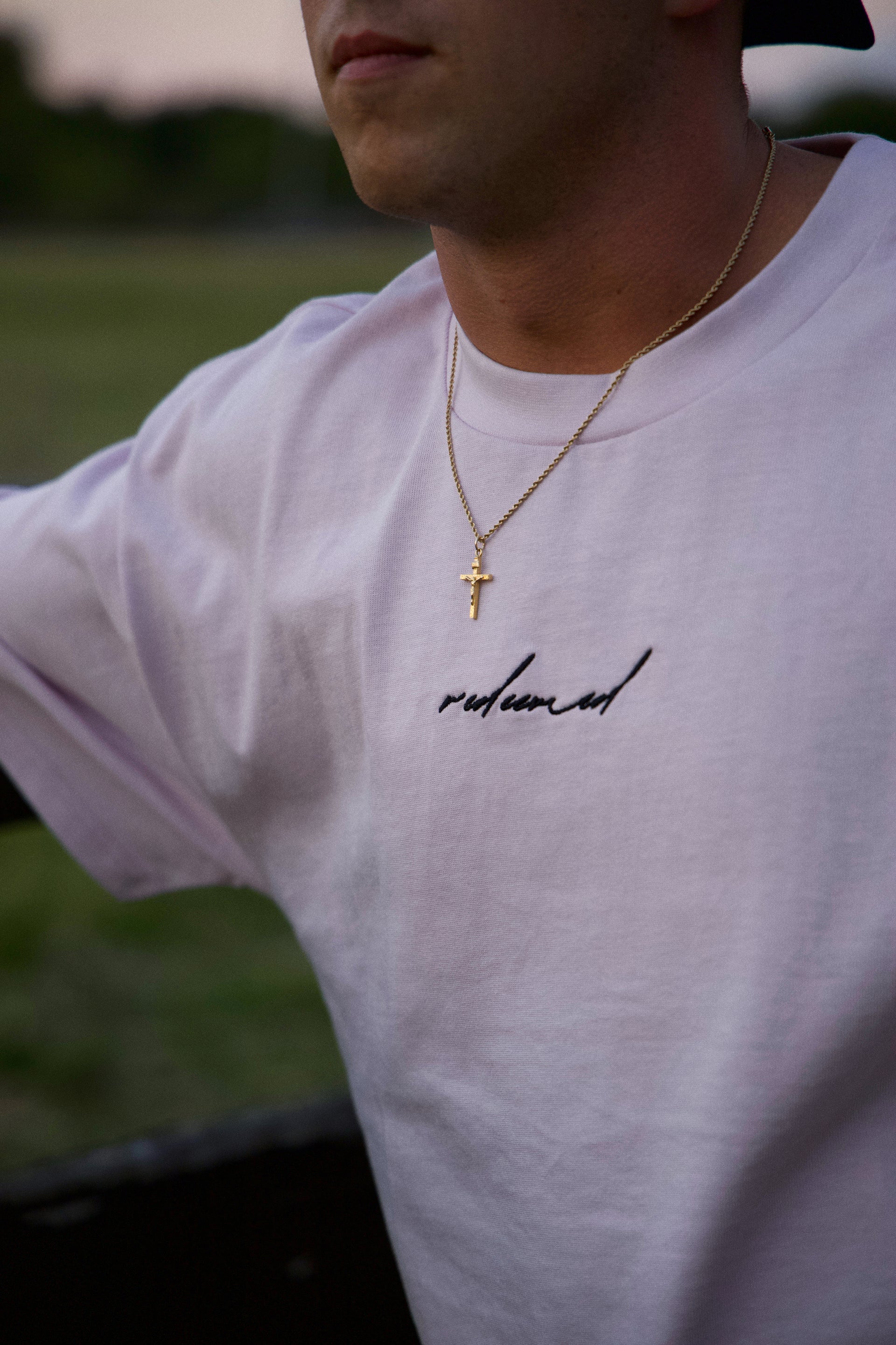REDEEMED TEE purple front embroidery detail